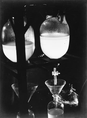 GEO-BLANC (active 1920s-40s) Laboratory scene with glass beakers.